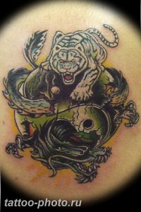 фото тату тигр и дракон 07.12.2018 №070 - tattoo tiger and dragon - tattoo-photo.ru